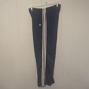 Adidas blue track pants with whites stripes